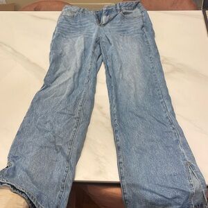 Never worn jeans with cut outs